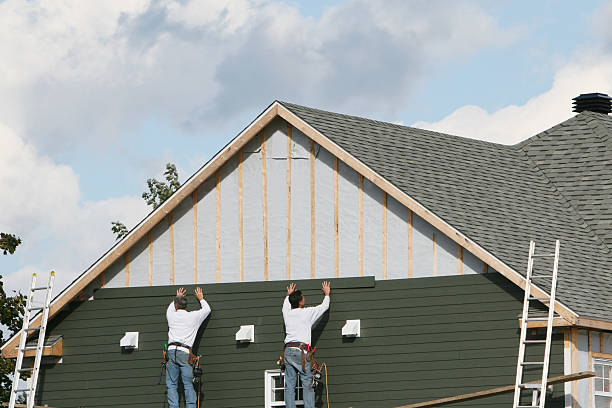 Professional Siding Contractor technician working in Massapequa Park, NY